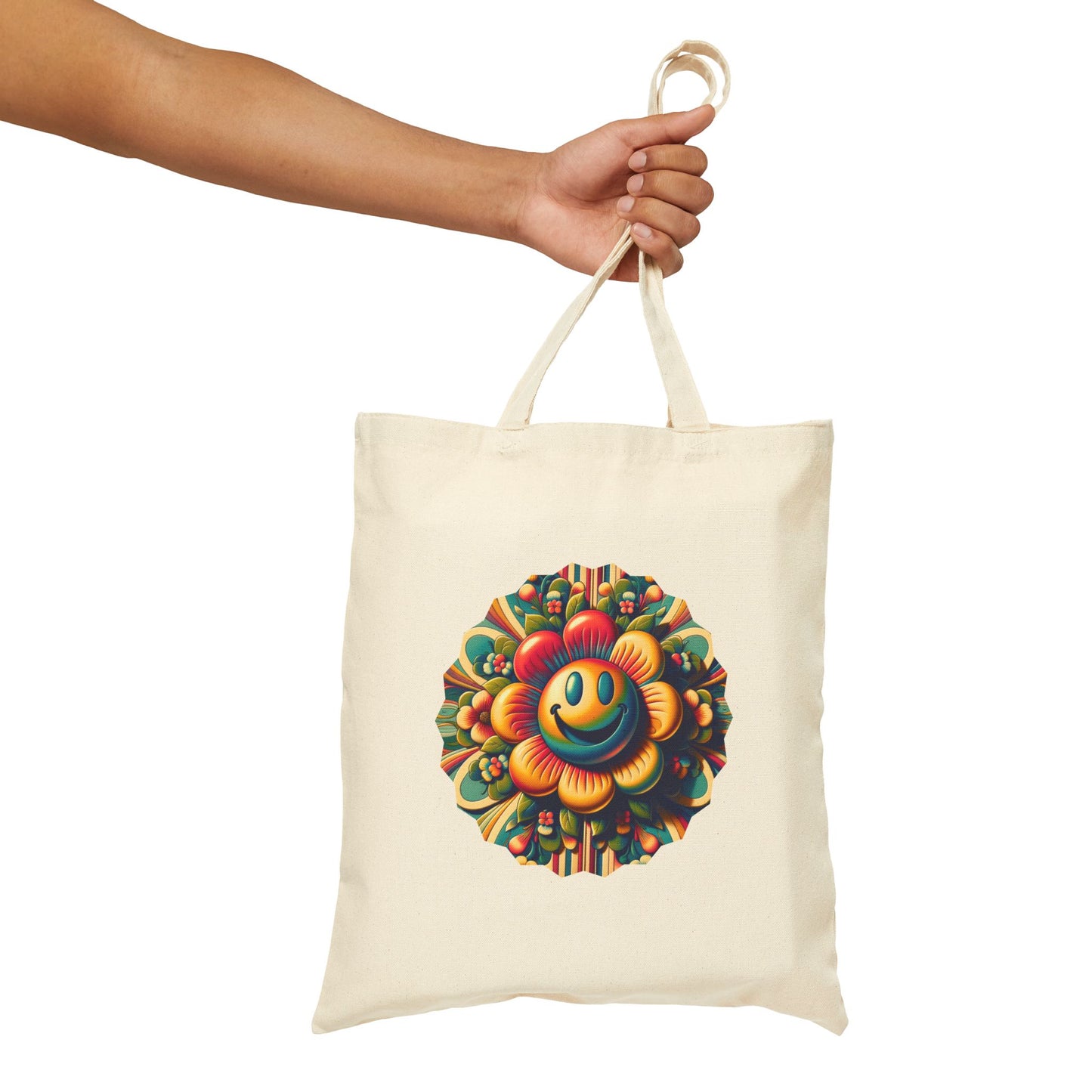 Tote bag with a colorful smiley face design held by a hand on a white background