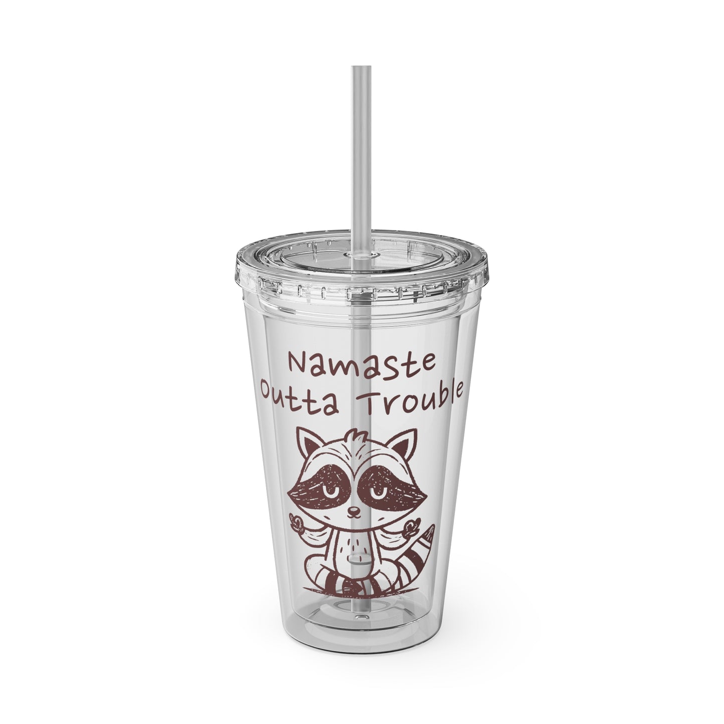 Clear tumbler with a raccoon illustration and text 'Namaste Outta Trouble' on a white background