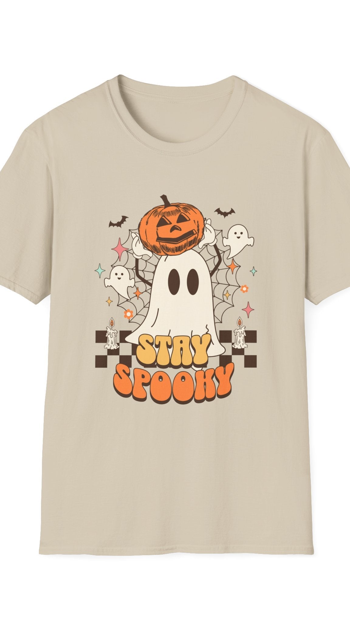 Beige t-shirt with Halloween-themed design featuring a ghost, pumpkin, and text on a white background.