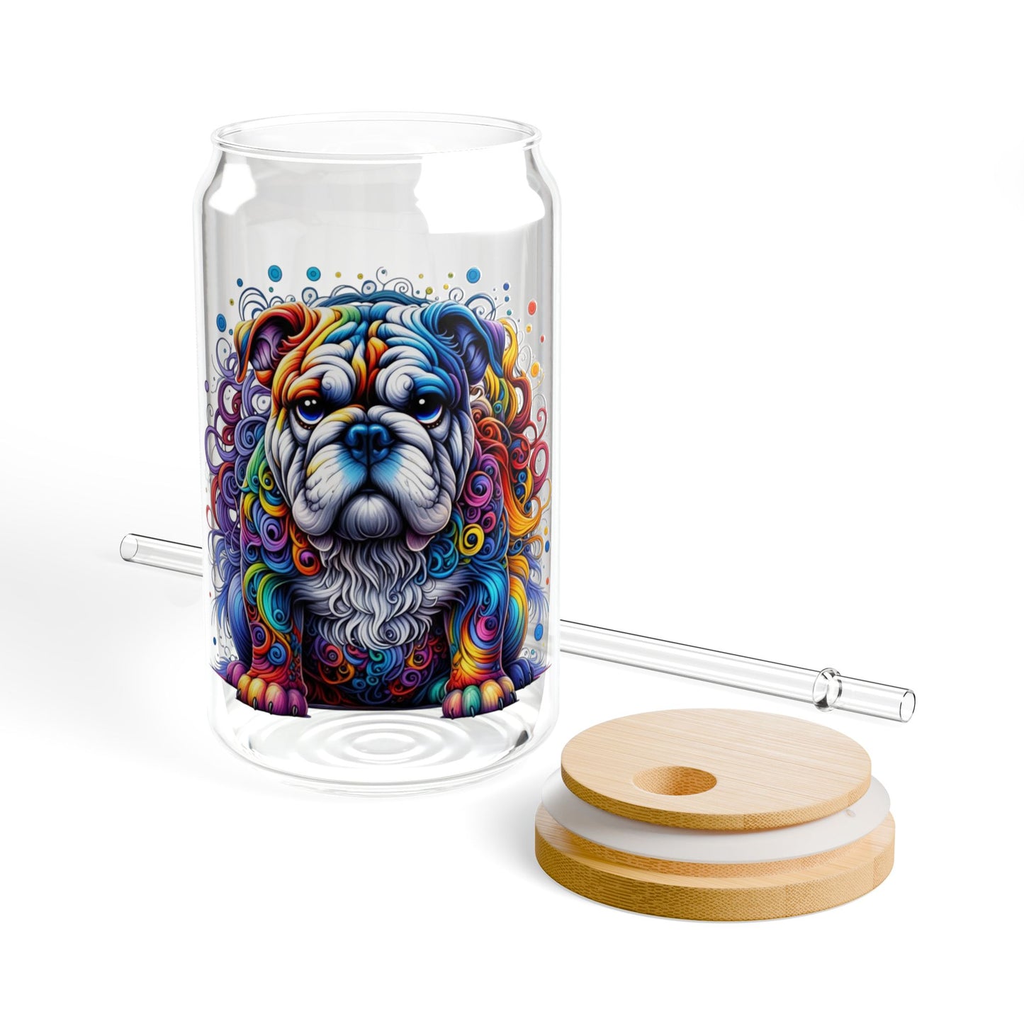 Glass tumbler with colorful dog illustration, wooden lid, and straw on a white background