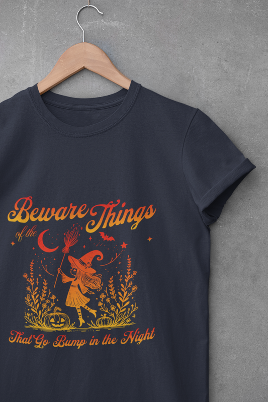 Navy blue t-shirt with Halloween-themed design featuring a witch and text on a gray background.