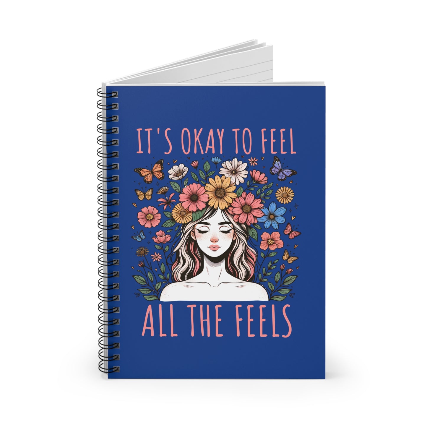Spiral-bound floral notebook with an illustrated woman, butterflies, and the words “It’s Okay to Feel All the Feels”