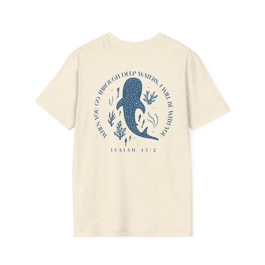 Beige t-shirt with blue whale graphic and text on a white background