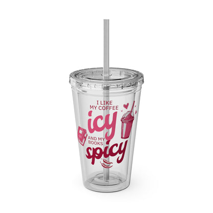 Clear acrylic tumbler with pink text reading “I like my coffee icy and my books spicy,” featuring icons of an iced drink and a book.