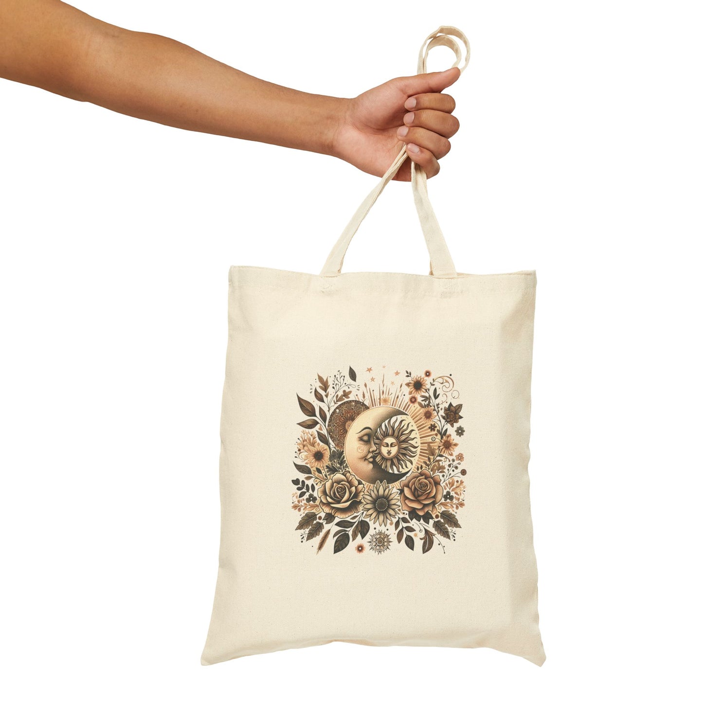 Natural cotton tote bag with a celestial design featuring a sun and moon surrounded by earthy-toned flowers and leaves.