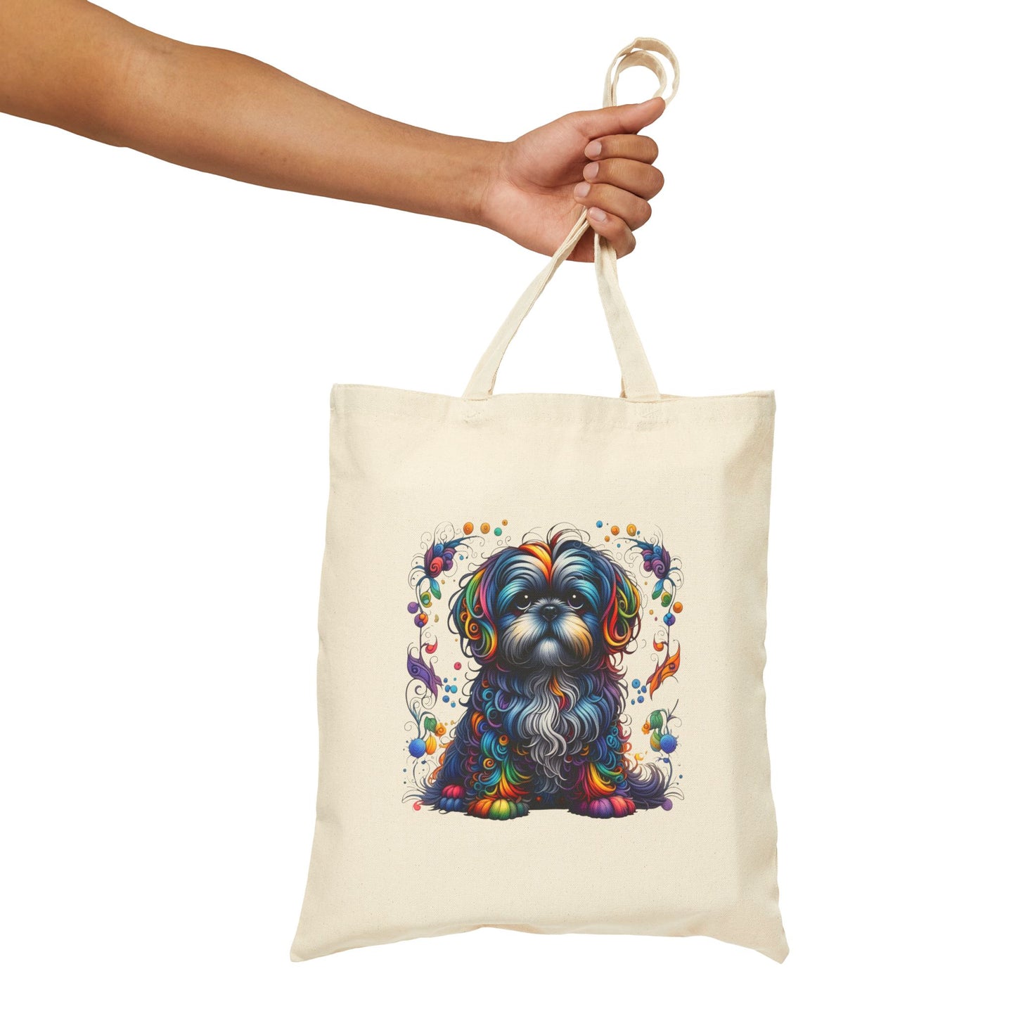 Tote bag with a colorful shih tzu dog illustration held by a hand on a white background