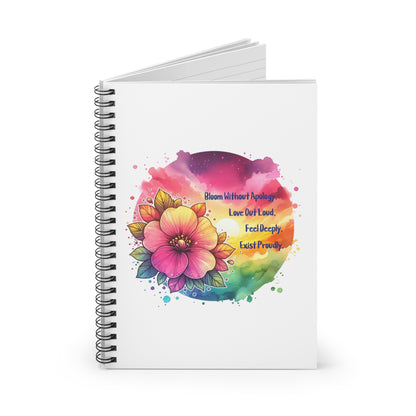 Notebook with a colorful floral design and text on the cover