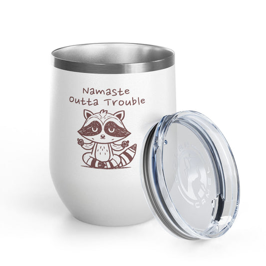 White tumbler with a raccoon illustration and text on a white background