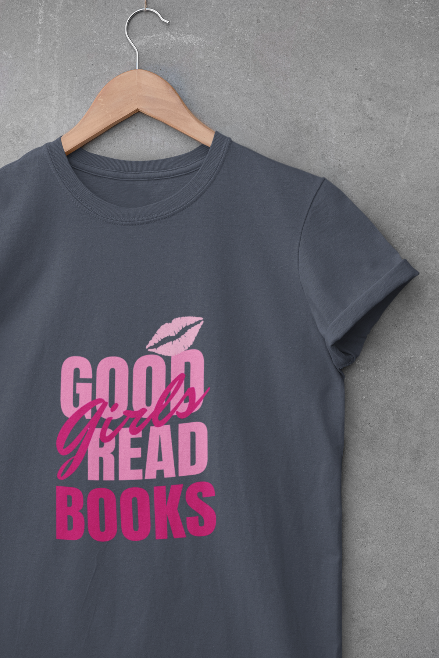 Dark gray t-shirt with pink and red “Good Girls Read Books” text and a lipstick kiss graphic