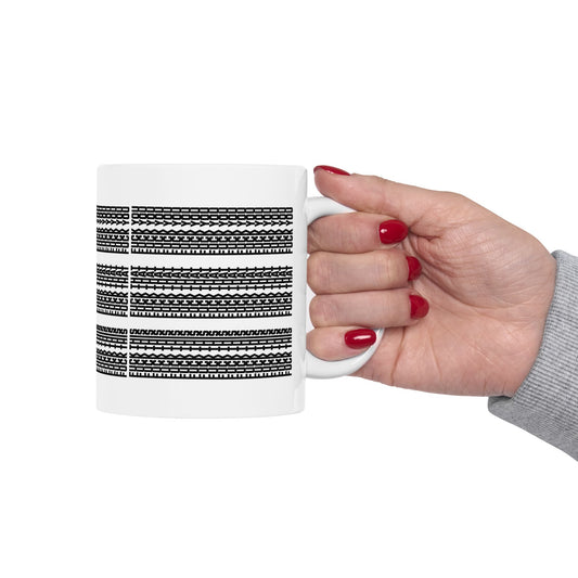 White ceramic mug featuring a black and white sideways text pattern that reads “fk this. fk that. f**k you.”—disguised as a geometric design.