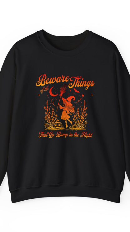 Black sweatshirt with orange graphic and text on a white background