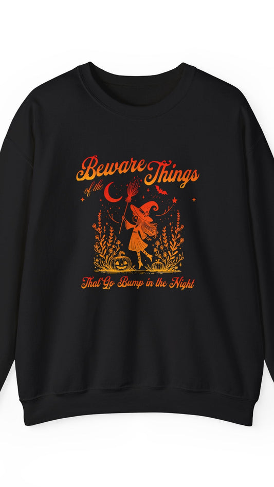 Black sweatshirt with orange graphic and text on a white background