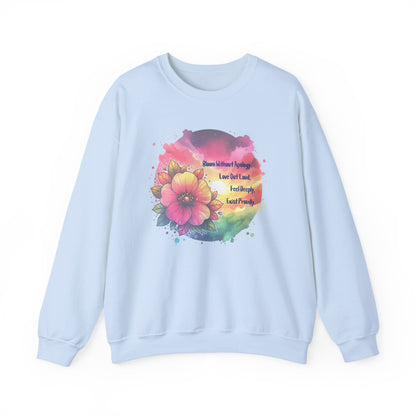 Light blue sweatshirt with a colorful flower design and text on a white background