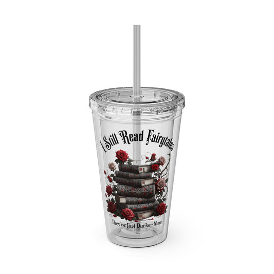 Clear tumbler with books and roses design and 'I Still Read Fairytales' text on a white background