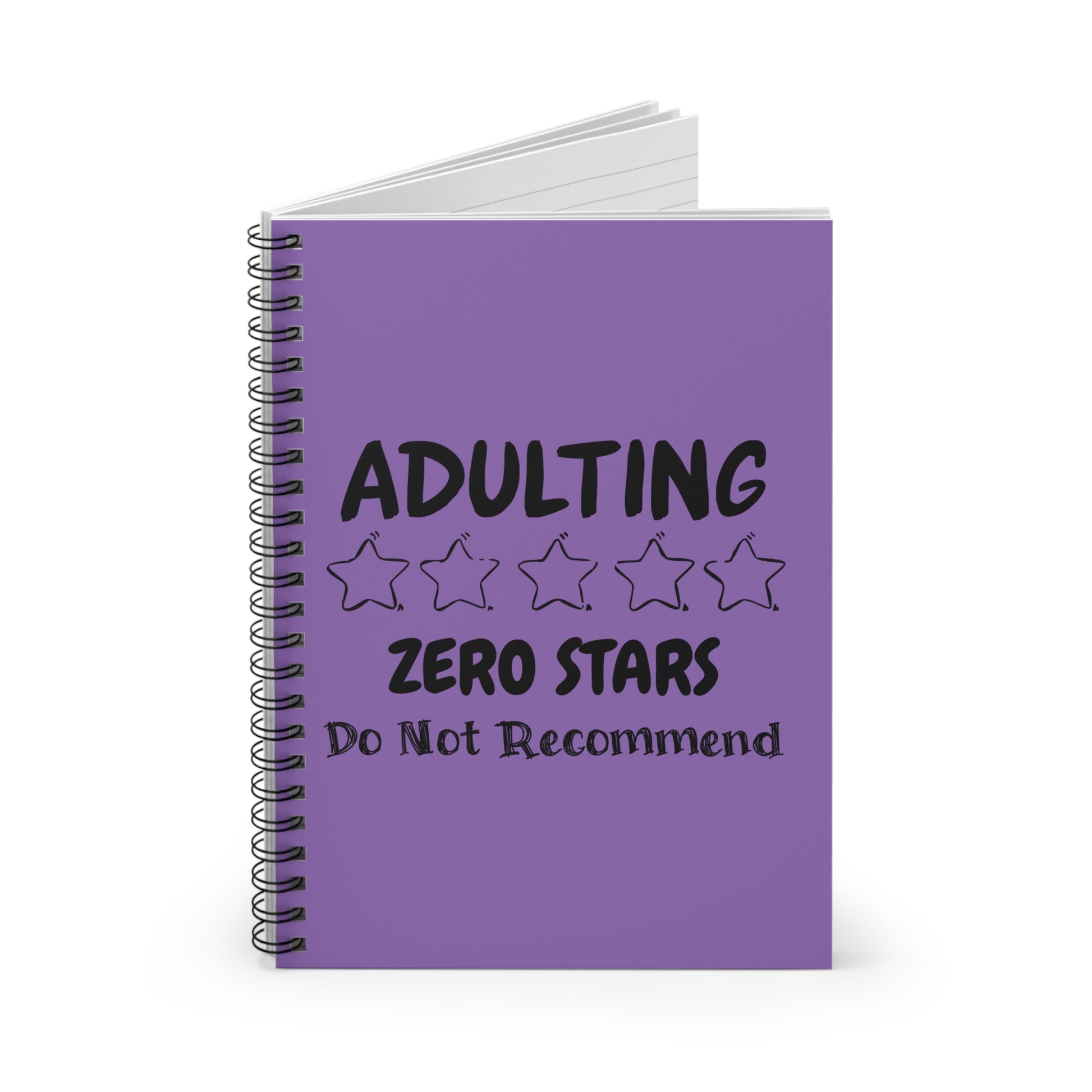 Purple spiral notebook with bold black text reading “Adulting – Zero Stars, Do Not Recommend”