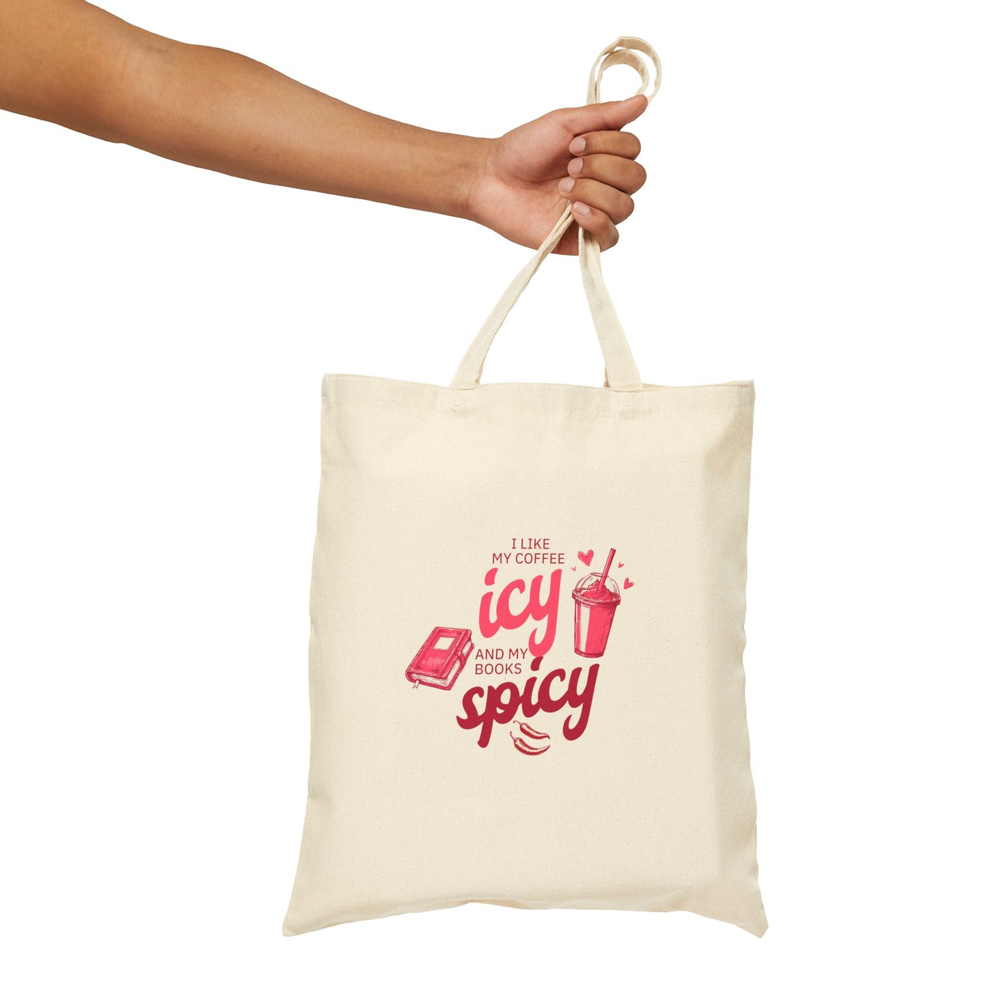 Natural cotton tote bag with pink text reading “I like my coffee icy and my books spicy,” featuring icons of an iced drink and a book.
