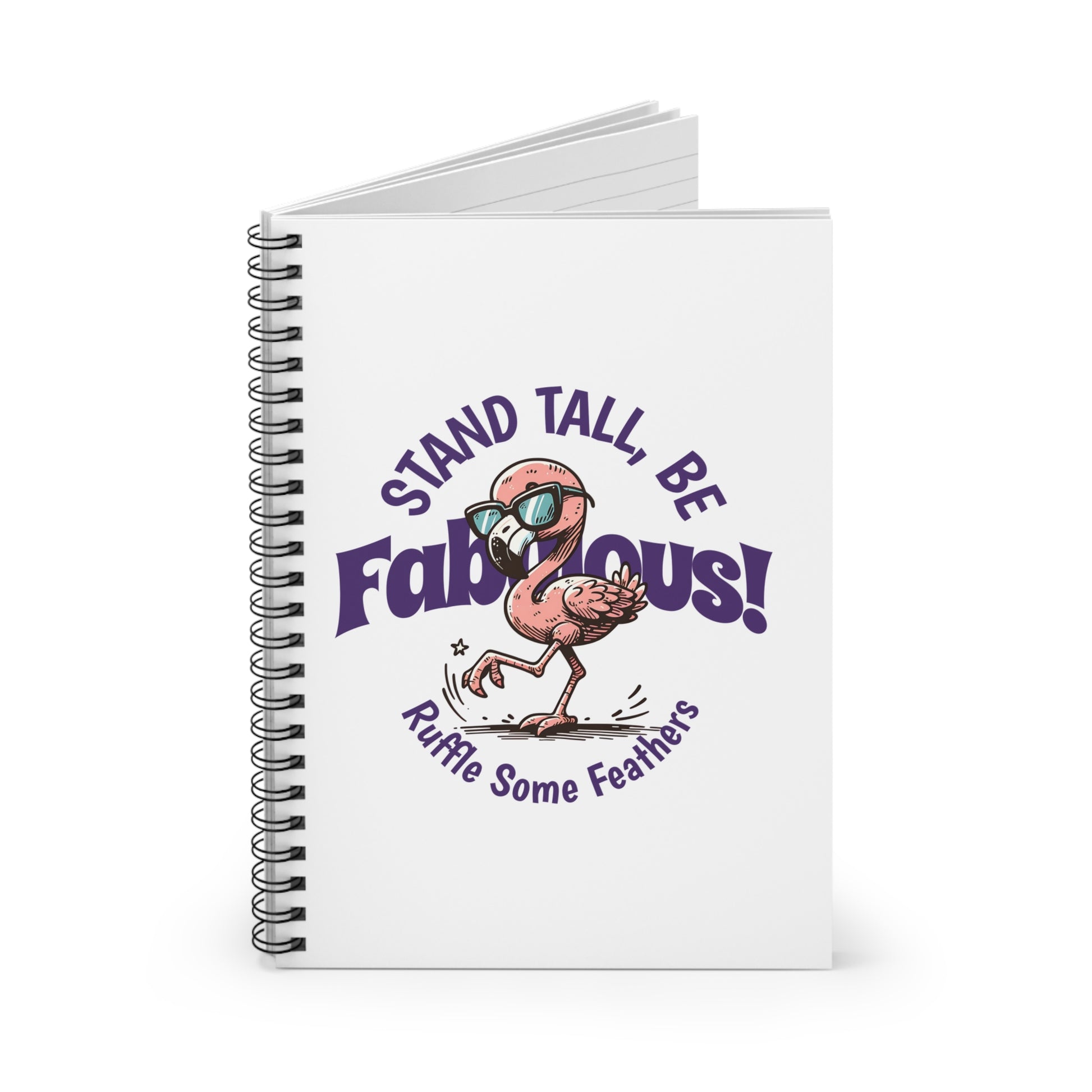 A spiral journal notebook with a white cover featuring a colorful flamingo character and the text 'STAND TALL, BE FABULOUS!'